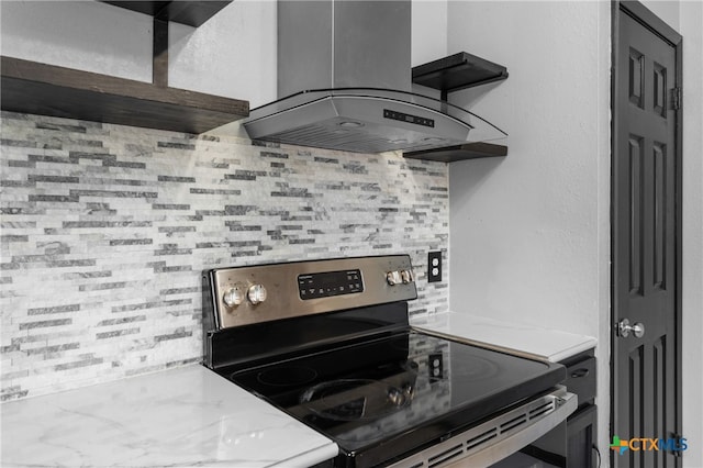 kitchen featuring extractor fan, light stone countertops, backsplash, and stainless steel electric stove