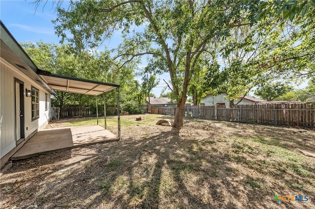 view of yard with a patio area