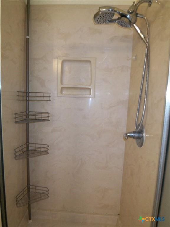 bathroom featuring a shower