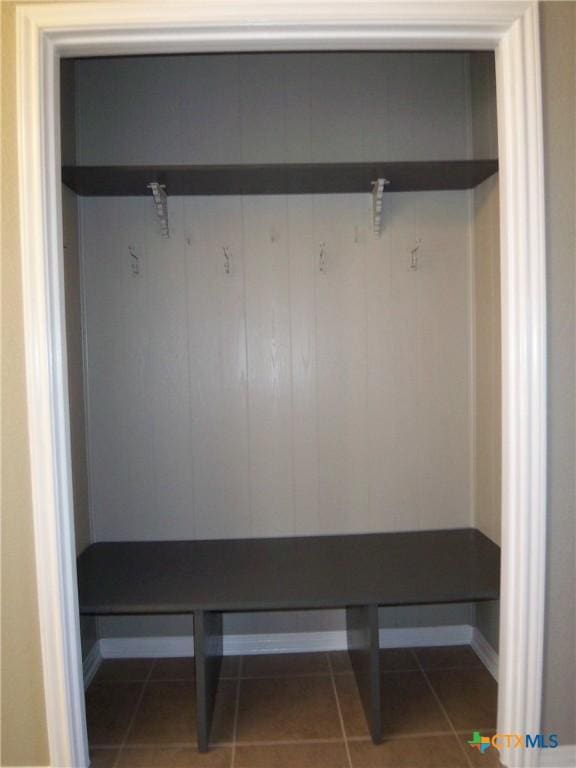 mudroom with tile patterned floors