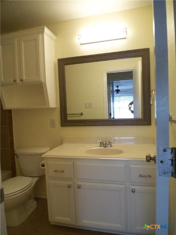 full bathroom featuring vanity, independent shower and bath, and toilet