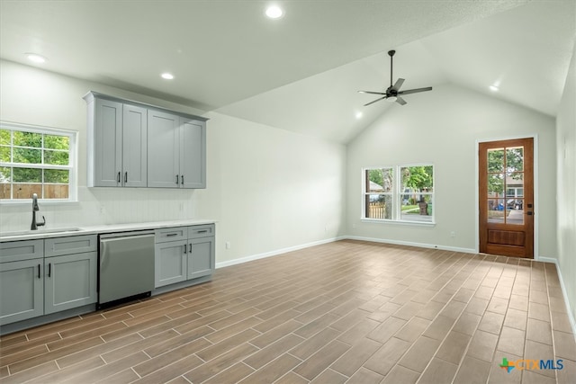 interior space with dishwasher, light wood-type flooring, plenty of natural light, and sink