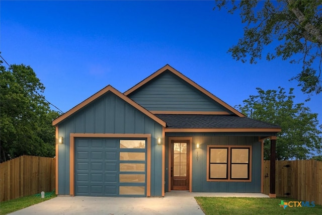 view of front of property featuring a garage