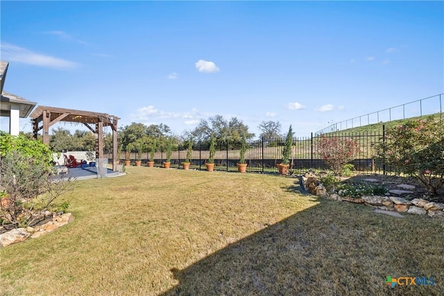 view of yard featuring a pergola and a patio