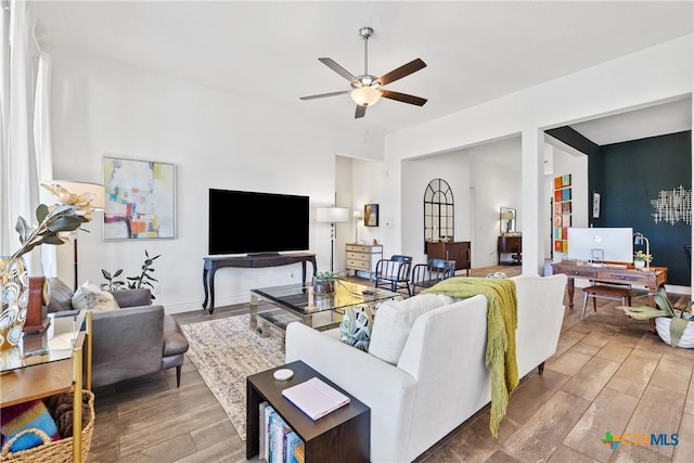 living room featuring ceiling fan