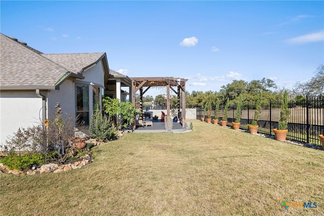 view of yard with a pergola and a patio