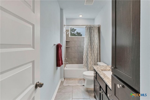 full bath with tile patterned flooring, toilet, vanity, visible vents, and shower / bath combo with shower curtain