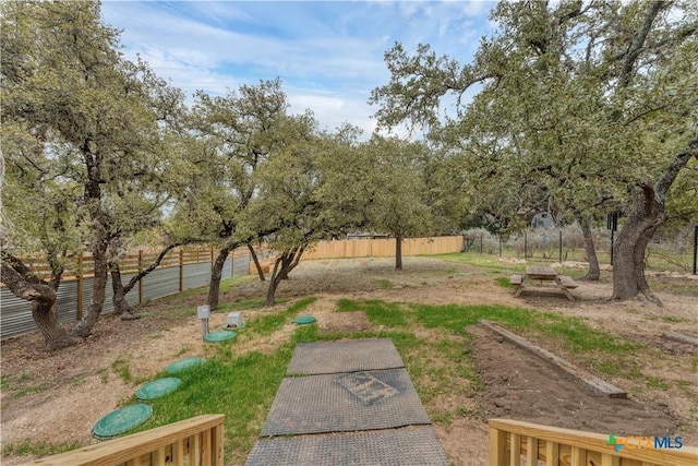 view of yard with fence