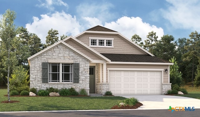 craftsman-style house with a garage and a front lawn