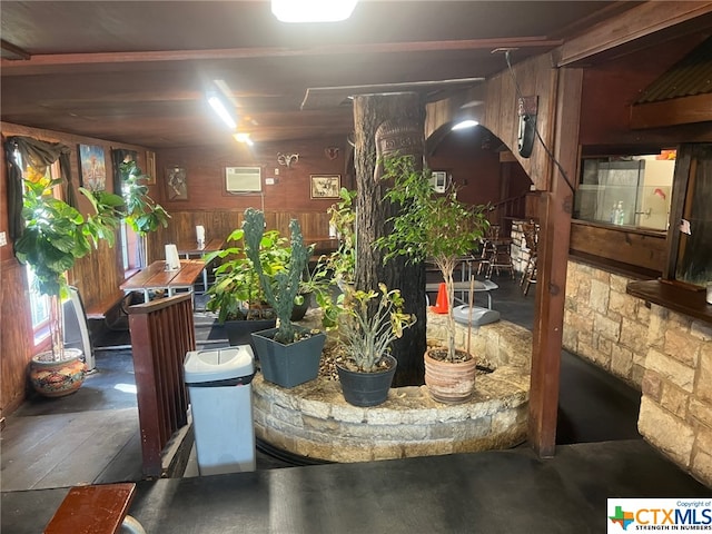 interior space featuring wood walls