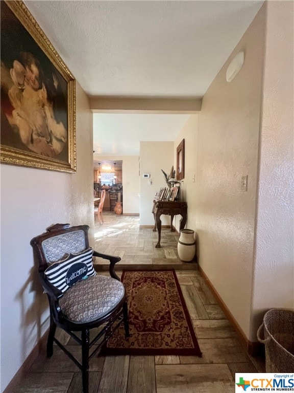 hallway featuring hardwood / wood-style floors