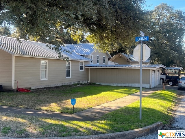 exterior space with a yard