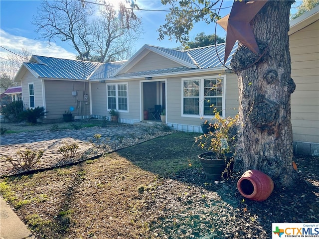 exterior space with a front lawn