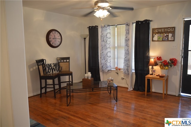 sitting room featuring hardwood / wood-style flooring and ceiling fan