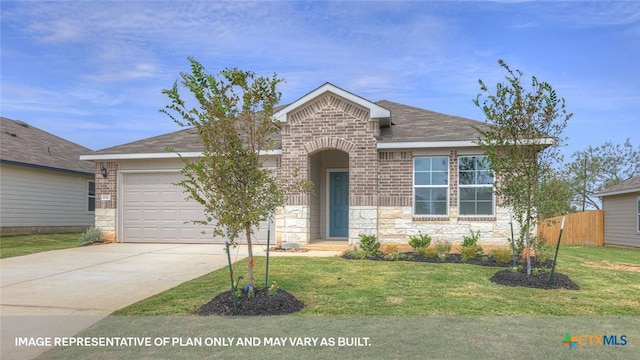 view of front facade featuring a garage and a front lawn