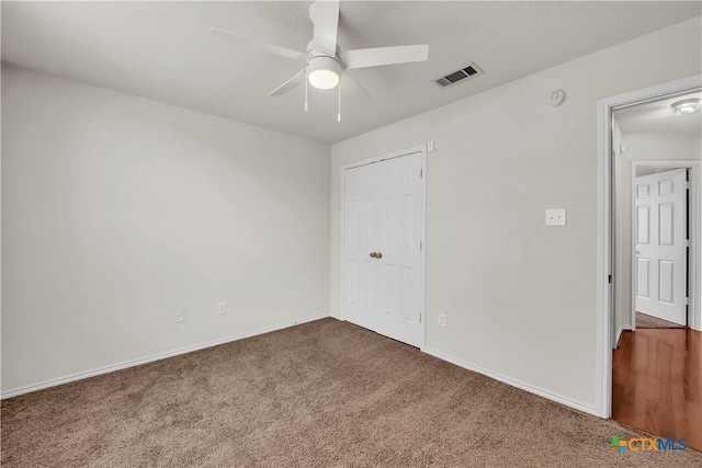 3037 Rain Dance Loop, Harker Heights, TX 76548 - unfurnished bedroom with carpet flooring, baseboards, and ceiling fan