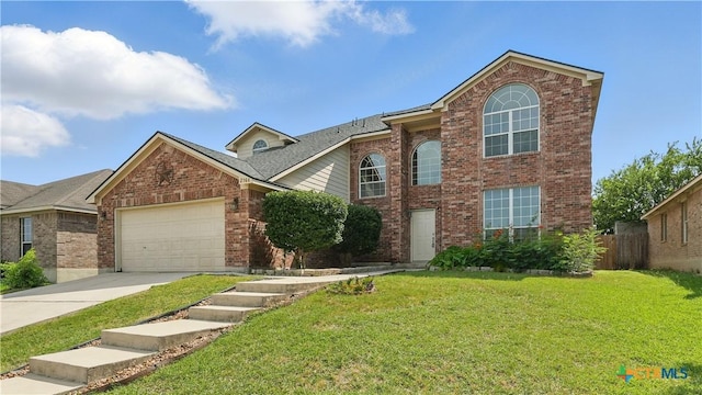 2166 Jolie Ct, New Braunfels, TX 78130 - traditional-style home featuring brick siding, a garage, and driveway