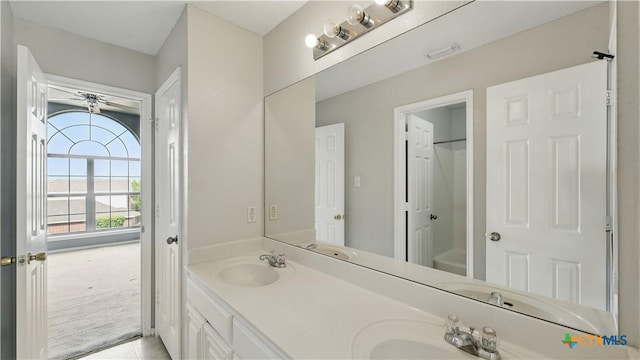 2166 Jolie Ct, New Braunfels, TX 78130 - full bath featuring double vanity, tile patterned flooring, and  shower combination