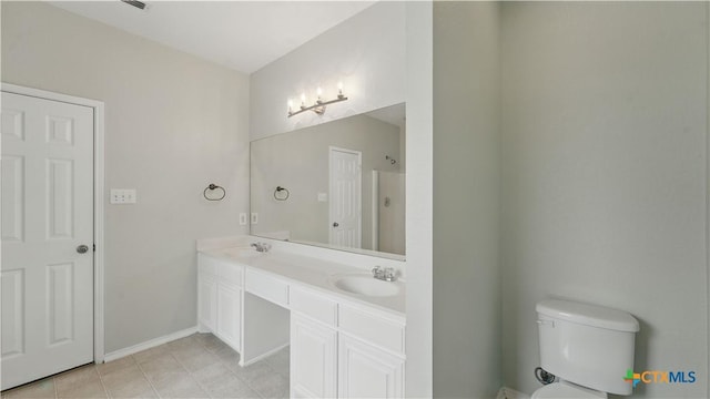2166 Jolie Ct, New Braunfels, TX 78130 - bathroom with double vanity and tile patterned floors