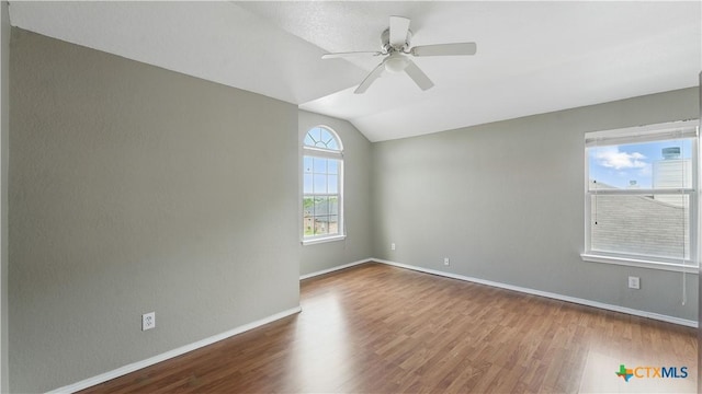 2166 Jolie Ct, New Braunfels, TX 78130 - unfurnished room featuring wood finished floors, a ceiling fan, and lofted ceiling