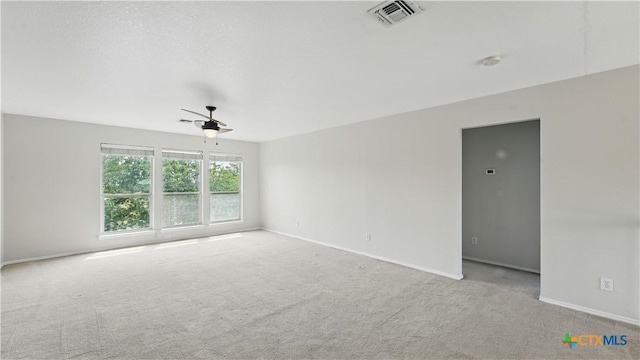 2166 Jolie Ct, New Braunfels, TX 78130 - empty room featuring ceiling fan, carpet floors, and a smoke detector