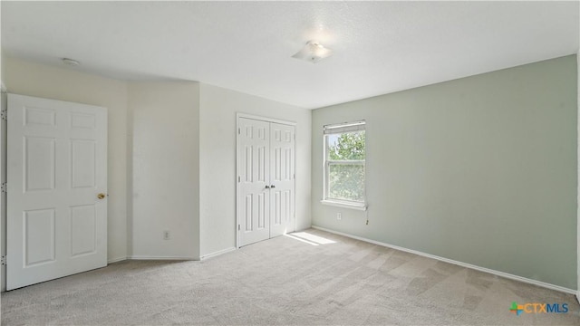 2166 Jolie Ct, New Braunfels, TX 78130 - unfurnished bedroom with carpet flooring and a closet