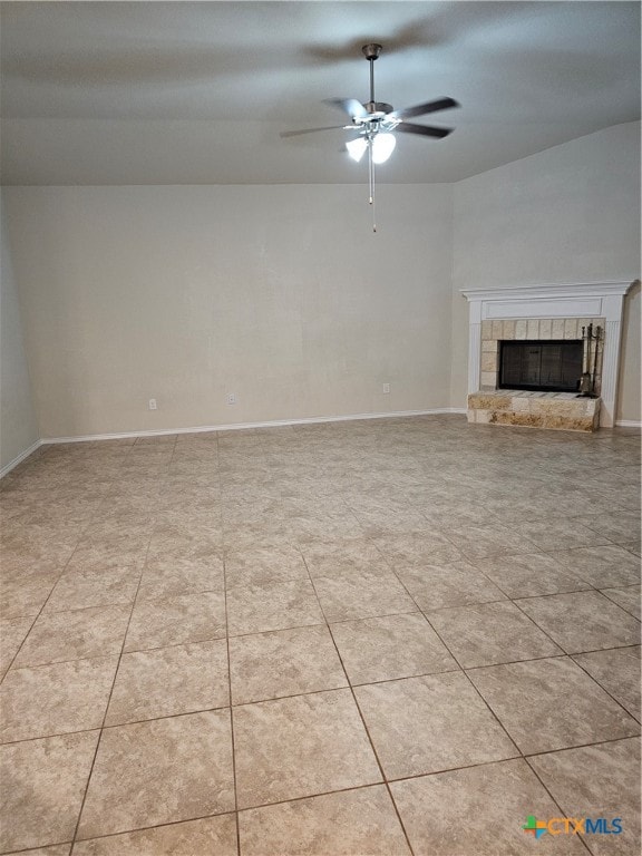 unfurnished living room with ceiling fan and light tile patterned floors