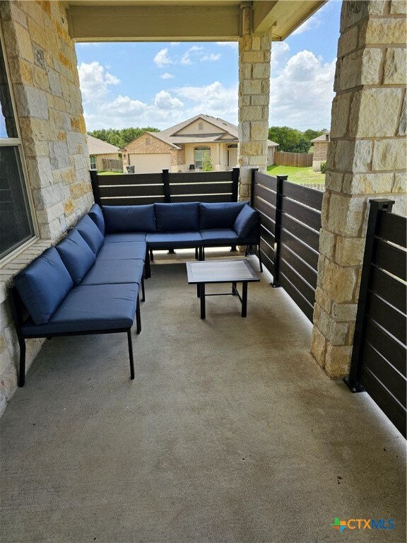 balcony featuring an outdoor living space