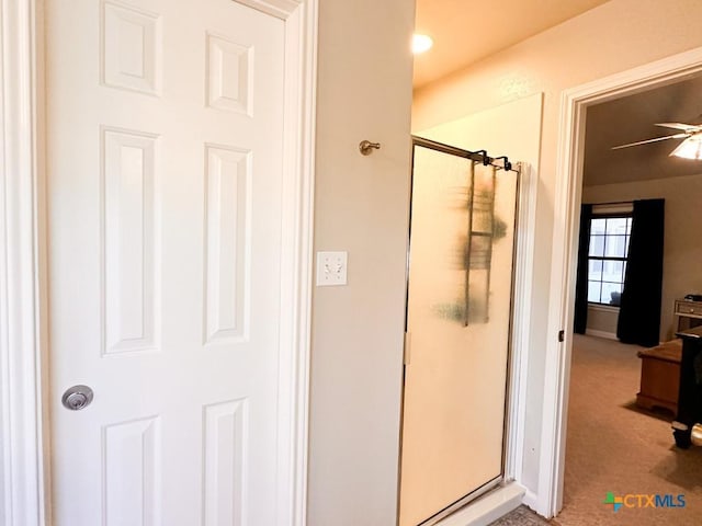 bathroom featuring ceiling fan