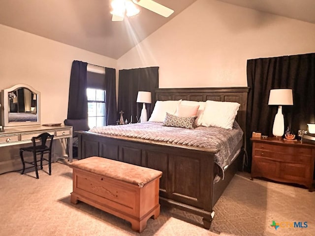 bedroom with lofted ceiling, light carpet, and ceiling fan