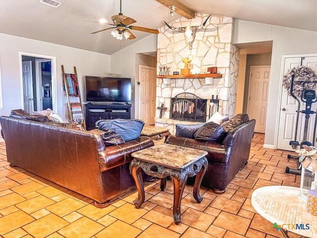 living room with ceiling fan, a fireplace, and lofted ceiling with beams