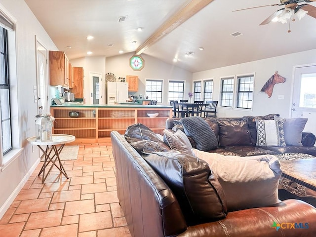 living room featuring vaulted ceiling with beams and ceiling fan