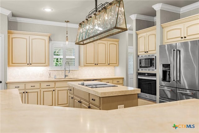 313 Treasure Oaks Rd, Inez, TX 77968 - kitchen with appliances with stainless steel finishes, cream cabinetry, a sink, light countertops, and backsplash