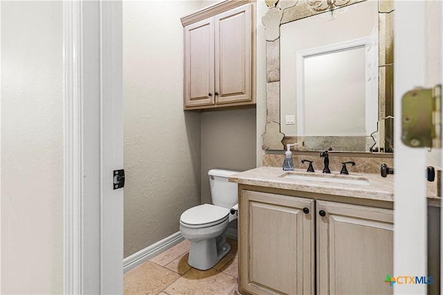 313 Treasure Oaks Rd, Inez, TX 77968 - half bath featuring vanity, toilet, and baseboards
