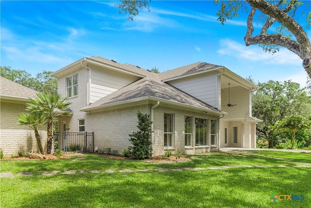 313 Treasure Oaks Rd, Inez, TX 77968 - view of side of home with brick siding and roof with shingles