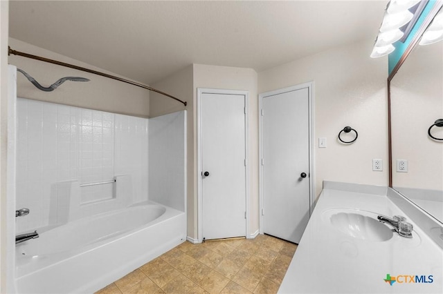 bathroom with shower / washtub combination and vanity