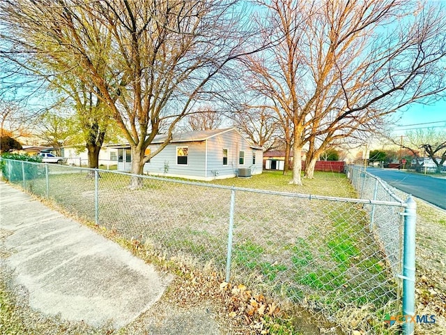 single story home featuring cooling unit