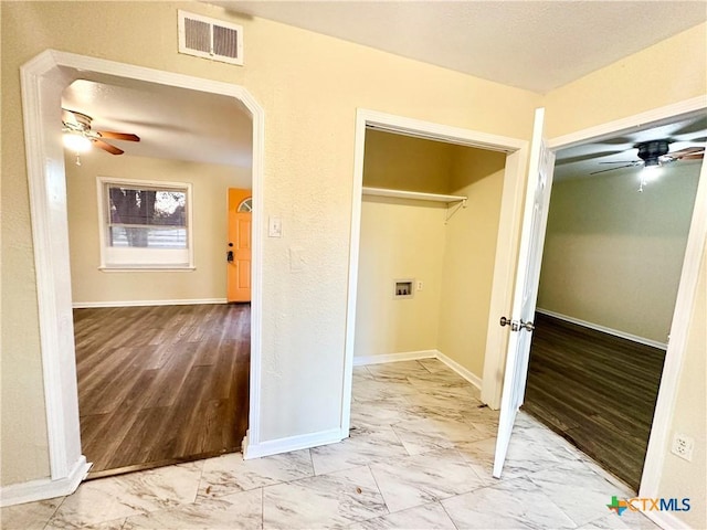 laundry room featuring ceiling fan and hookup for a washing machine