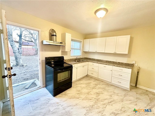 kitchen featuring white cabinetry, sink, electric range, wall chimney range hood, and a textured ceiling