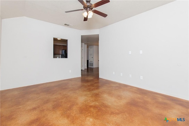 empty room with visible vents and a ceiling fan