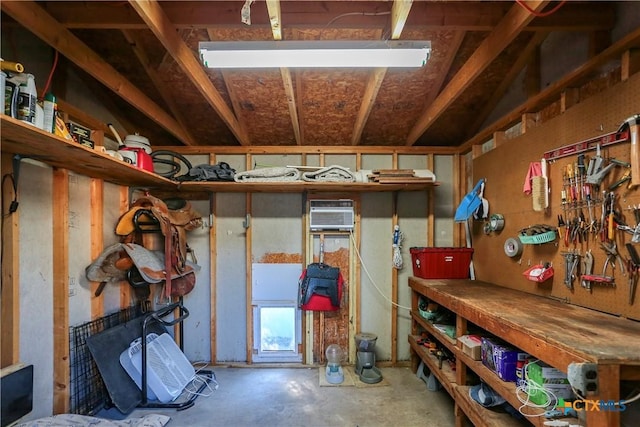 storage area with a wall mounted AC