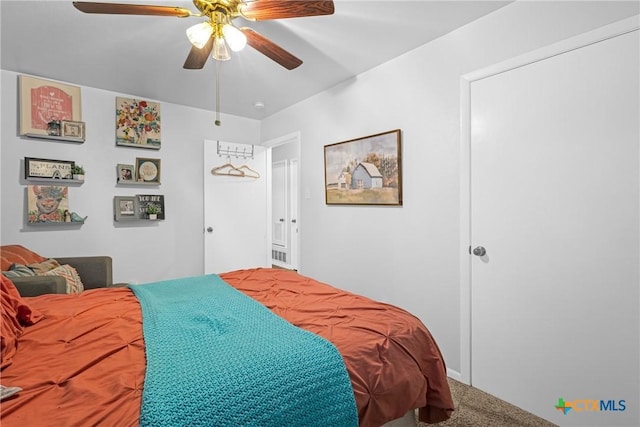 bedroom featuring carpet flooring and ceiling fan