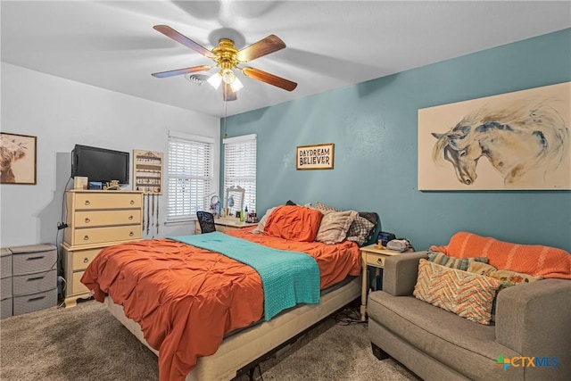 bedroom with carpet floors and a ceiling fan