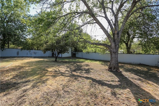 view of yard with fence