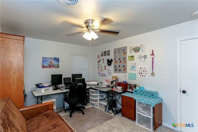 office with ceiling fan and light carpet