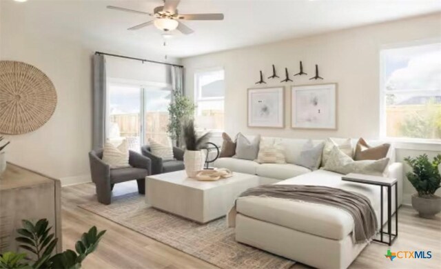 544 Bauer Loop, Liberty Hill, TX 78642 - living room featuring light wood-type flooring and ceiling fan