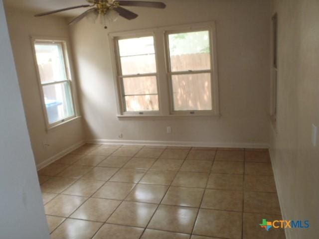 335 Hot Wells Blvd, San Antonio, TX 78223 - spare room with a ceiling fan and tile patterned flooring