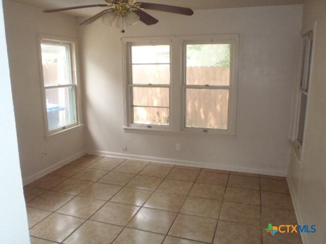 335 Hot Wells Blvd, San Antonio, TX 78223 - spare room with a ceiling fan and light tile patterned floors