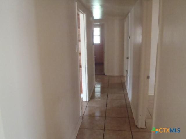 335 Hot Wells Blvd, San Antonio, TX 78223 - corridor with light tile patterned flooring
