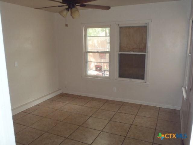 335 Hot Wells Blvd, San Antonio, TX 78223 - unfurnished room with a ceiling fan and light tile patterned floors